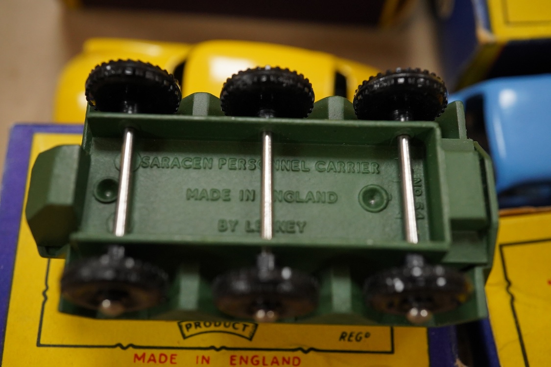 Eleven boxed Matchbox Series 1-75 regular wheels vehicles; 46; Morris Minor, 48; Meteor sports boat and trailer, 50; Commer pick-up truck (creasing to one end of the box), 54; Saracen personnel carrier, 55; DUKW amphibia